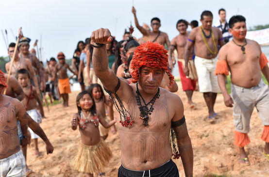 Indigenous Mundurukú people protesting the planned construction of a dam on the Tapajos river in Brazil