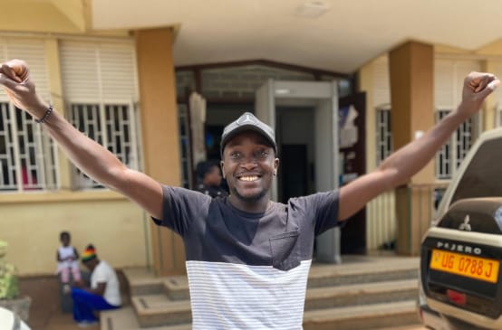 Students celebrate the dismissal of charges against them