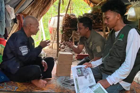 Three men in a tent