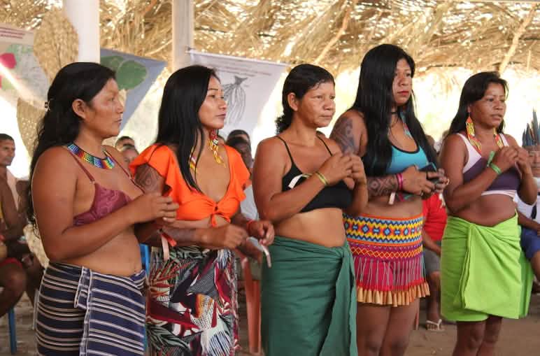 Indigenous women taking part in a meeting