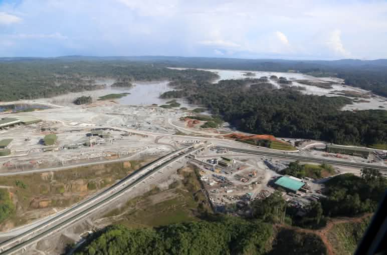 Aerial view of a copper mine cut into the rainforest