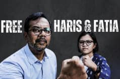 Haris Azhar and Fatia Maulidiyanti before a black background