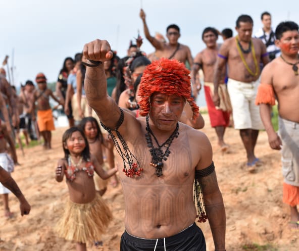 Indigenous Mundurukú people protesting the planned construction of a dam on the Tapajos river in Brazil