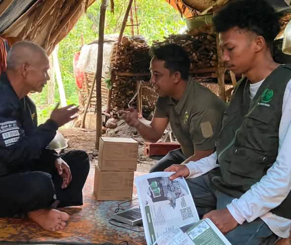 Three men in a tent