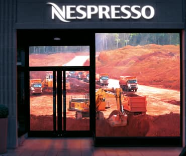 Nespresso shop window with a bauxite mine