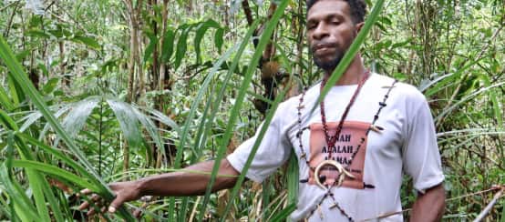 Hendrikus Woro defends the rights of Indigenous Papuans to their forest and land (© Pusaka) Hendrikus Woro of the Awyu people