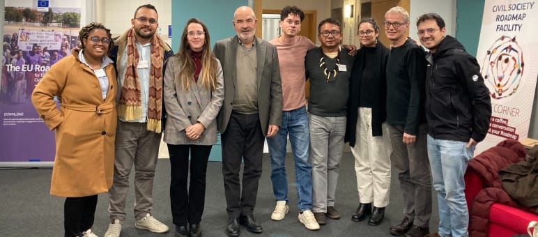 Group photo of nine people in an office of the European Commission