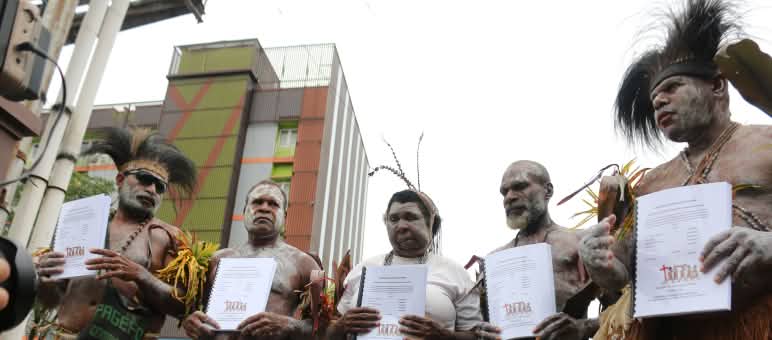 Five Marind with their legal complaint