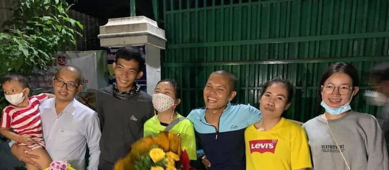 Three men and three women from Mother Nature Cambodia smiling after their release