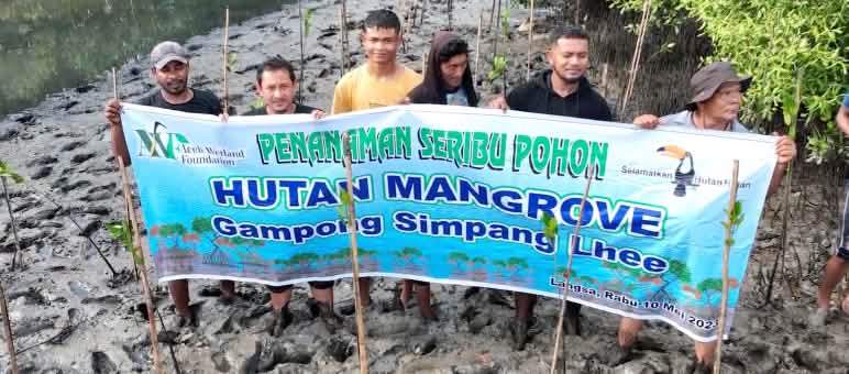 Banner "Planting a thousand trees. Mangrove forest. Simpang Lhee Village"