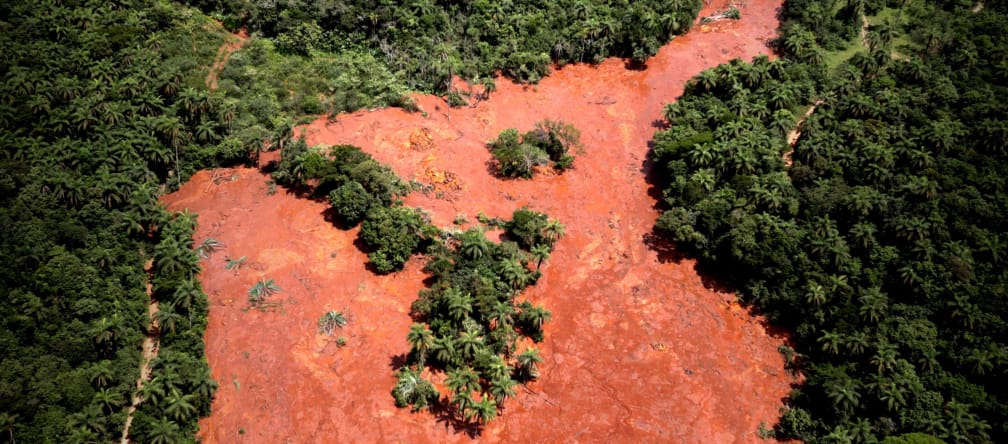 The wave of toxic sludge wiped out everything in its path, killing at least 157 people. Dam collapse in Brazil