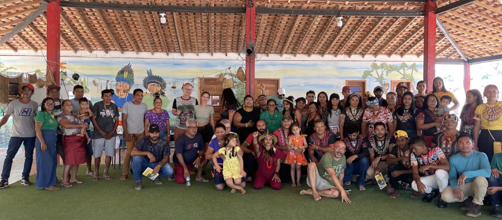 Around 50 people pose for a group photo
