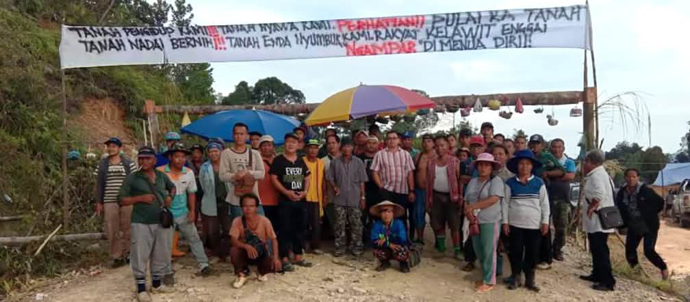 A roadblock set up by indigenous people A roadblock set up by indigenous people