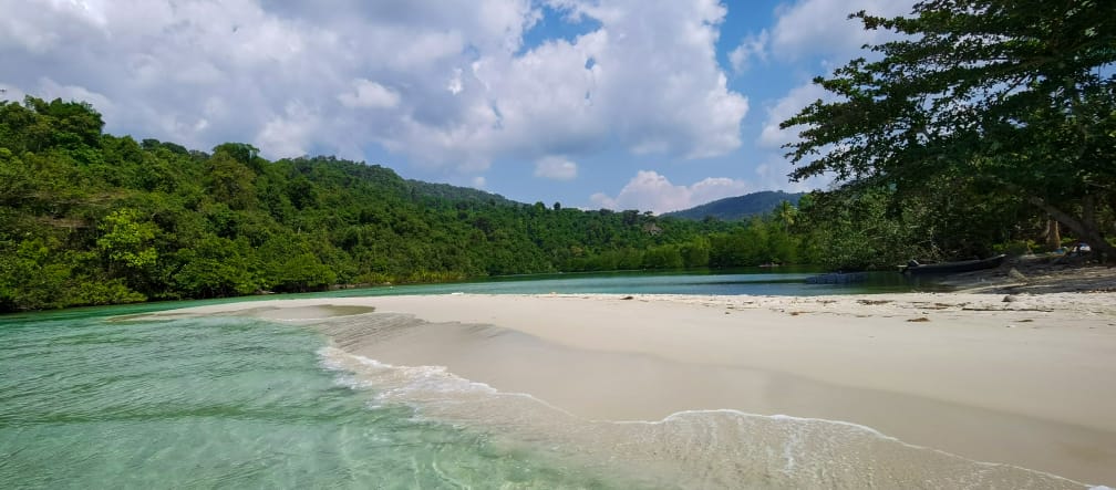 Waves wash over a beach on Koh Kong Island, Cambodia