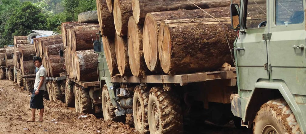 Logs on trucks in Myanmar Myanmar: logs on trucks