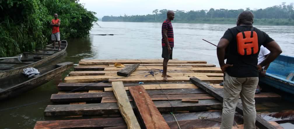 Odey Oyama (right) on a loggers' raft