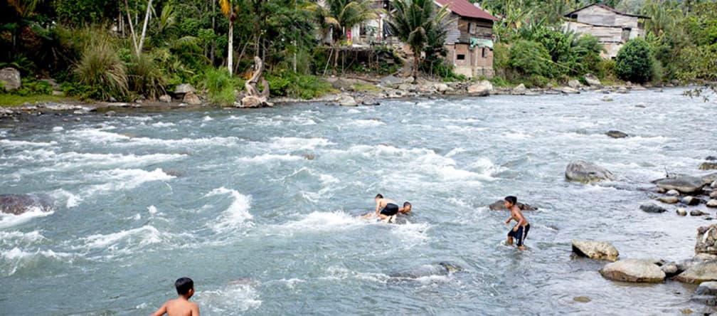 Children playing in the river