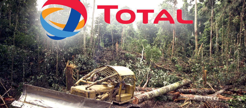 Rainforests are being destroyed for “green” palm oil-based biofuels Rainforest clearing, Total logo