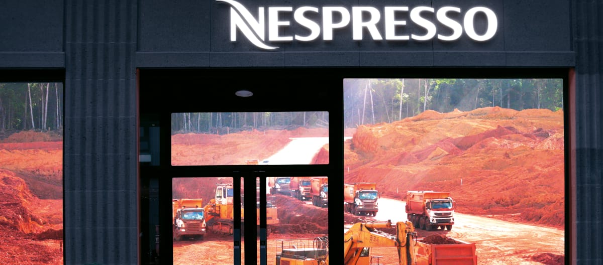 Nespresso shop window with a bauxite mine