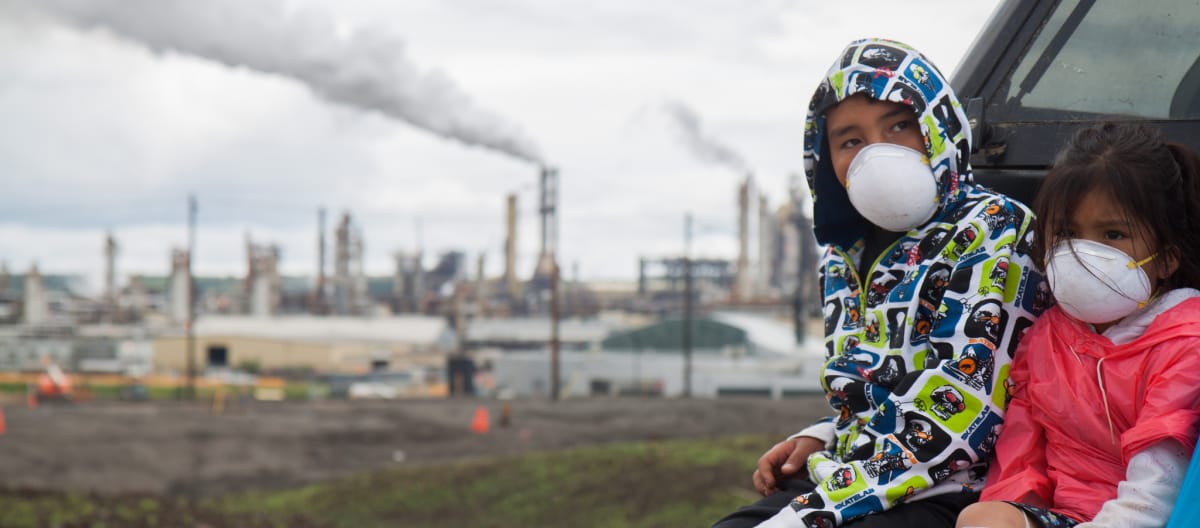 Children with face masks during the 2013 Healing Walk against tar sand mining