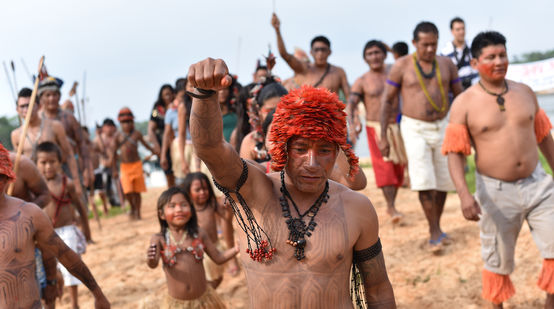 Indigenous Mundurukú people protesting the planned construction of a dam on the Tapajos river in Brazil