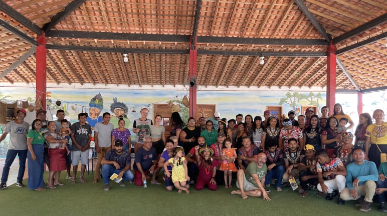 Around 50 people pose for a group photo