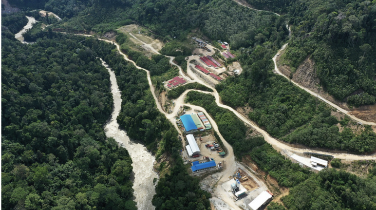 Ongoing construction in Tapanuli orangutan habitat Construction site in forest near a river