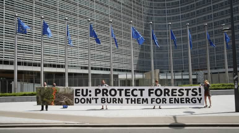 Environmentalists protesting outside the building of the European Commission in Brussels Activists outside the European Commission, Brussels