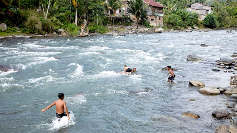 Children playing in the river