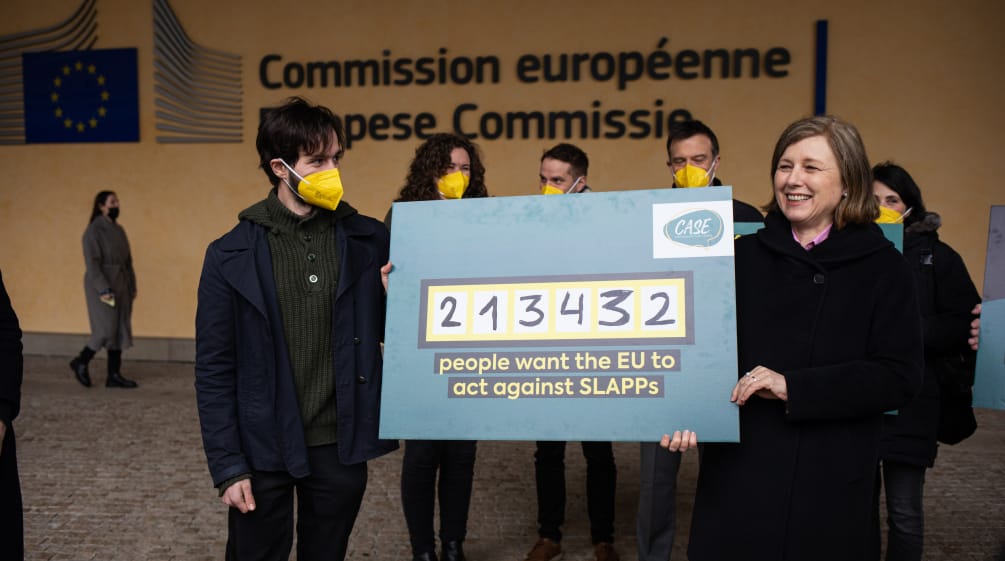 EU Commissioner Věra Jourová (right) accepts the petition