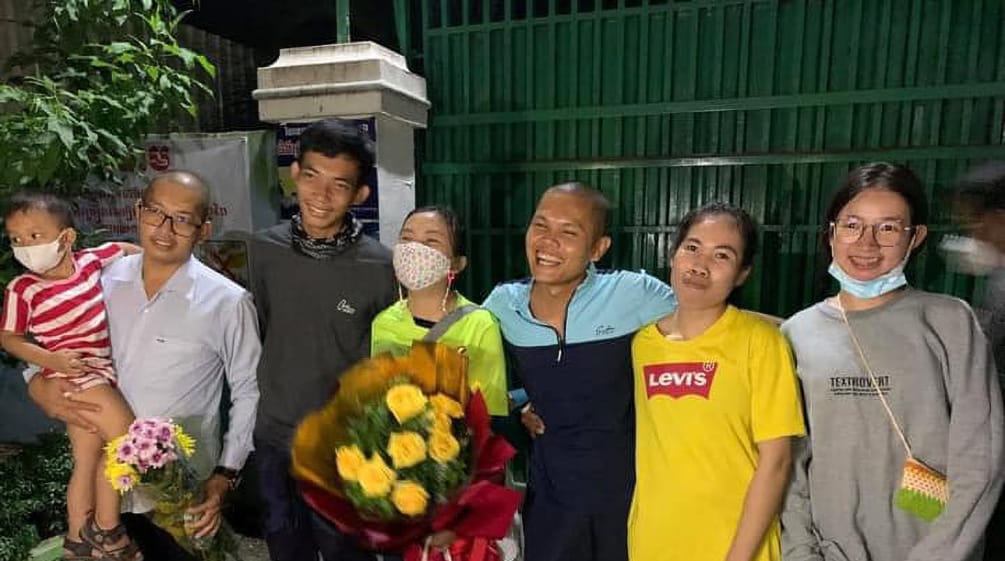 Three men and three women from Mother Nature Cambodia smiling after their release