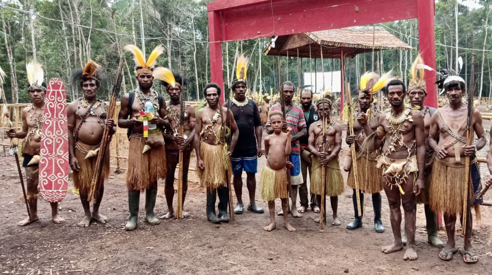 The Awyu of Boven Digoel are fighting for justice, land rights and the rainforest Group of Indigenous Awyu in traditional clothing
