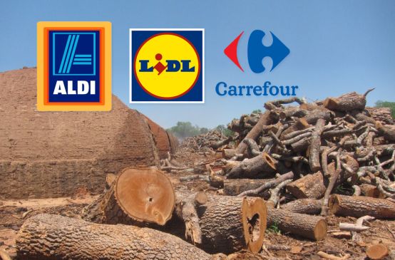 Primitive charcoal ovens and felled trees in the Paraguayan Chaco together with the brand logos of Aldi, Carrefour, Lidl