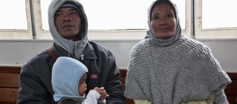 Bidin, Ida and their son Agung A family with child: Bidin, Ida and son Agung