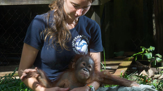 Veterinarian Karmele Llano-Sanchez and a young orphan Veterinarian Karmele Llano