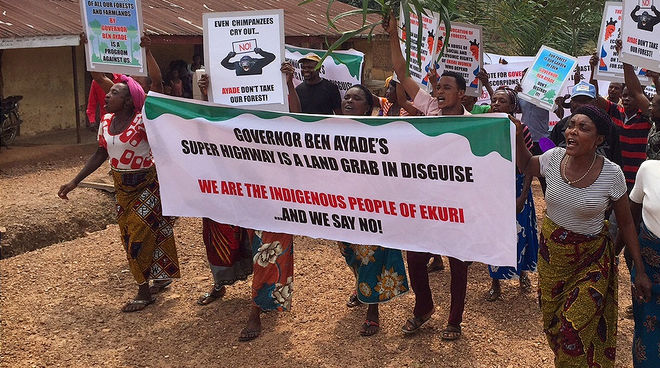 The Ekuri are fighting to preserve their forest. Ekuri people protesting the "superhighway" project