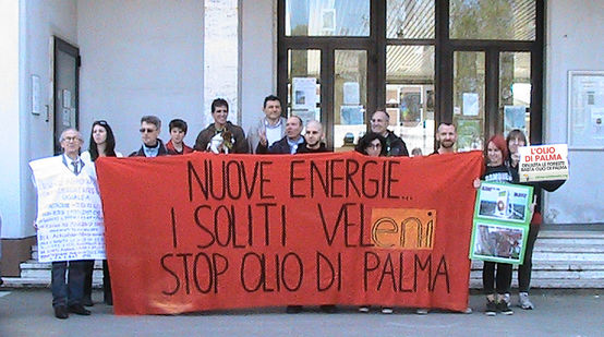 Environmentalists with their protest banners in front of the city hall of Marghera, Italy