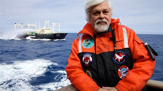 Paul Watson sitting in a boat on sea