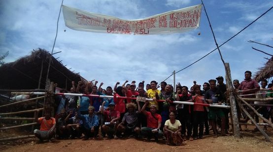Indigenous people blocking a logging road in western Malaysia
