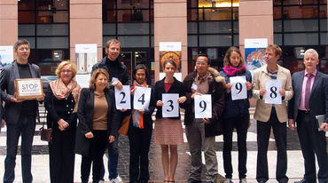 Environmental activists hand over the signatures to members of the European Parliament