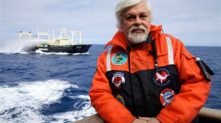 Paul Watson sitting in a boat on sea